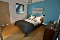 Łóżko lub łóżka w pokoju w obiekcie Le 46 - T2 rénové, confortable proche centre-ville