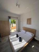 Posteľ alebo postele v izbe v ubytovaní PebBle Apartments