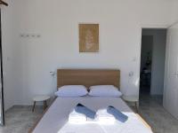 Posteľ alebo postele v izbe v ubytovaní PebBle Apartments