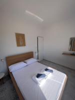 Posteľ alebo postele v izbe v ubytovaní PebBle Apartments