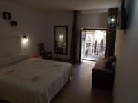 A bed or beds in a room at Via Roma 28