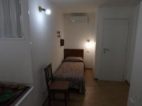 A bed or beds in a room at Via Roma 28
