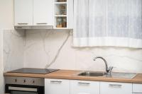 Kuchyň nebo kuchyňský kout v ubytování Sea Salt Apartments