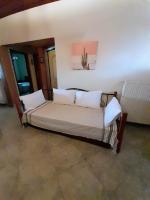 A bed or beds in a room at Niki House