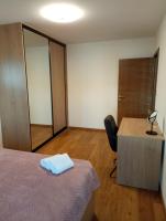 Postel nebo postele na pokoji v ubytování Nibela Apartments II