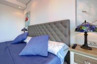 A bed or beds in a room at Estepona Mar Azul Aparthotel