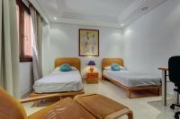 A bed or beds in a room at Estepona Mar Azul Aparthotel