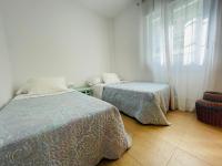 Posteľ alebo postele v izbe v ubytovaní Apartamento Ría Punta Umbría