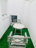 Televízia a/alebo spoločenská miestnosť v ubytovaní Apartamento Ría Punta Umbría