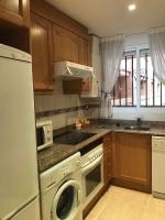 A kitchen or kitchenette at Apartamento a primera linea de playa ideal para relajarte - COSTA MARINA III