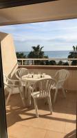 A balcony or terrace at Apartamento a primera linea de playa ideal para relajarte - COSTA MARINA III
