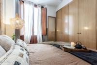 Postel nebo postele na pokoji v ubytování TETELA- 1 Bedroom Apartment with shared pool in Centro