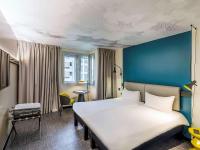 Postel nebo postele na pokoji v ubytování Hotel ibis Lisboa Saldanha
