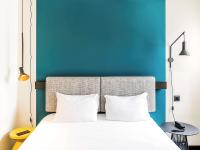 Postel nebo postele na pokoji v ubytování Hotel ibis Lisboa Saldanha