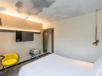 Postel nebo postele na pokoji v ubytování Hotel ibis Lisboa Saldanha