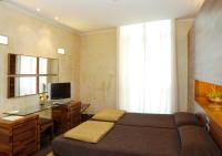 TV a/nebo společenská místnost v ubytování Hotel Tritone
