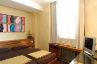TV a/nebo společenská místnost v ubytování Hotel Tritone