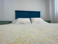 Posteľ alebo postele v izbe v ubytovaní Apartamento Ría Punta Umbría