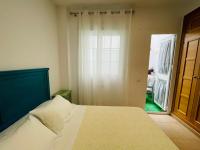 Posteľ alebo postele v izbe v ubytovaní Apartamento Ría Punta Umbría