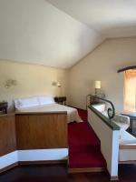 Posteľ alebo postele v izbe v ubytovaní Hotel Gattapone