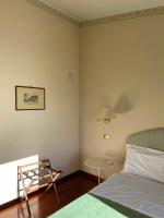 Posteľ alebo postele v izbe v ubytovaní Hotel Gattapone