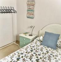 Postel nebo postele na pokoji v ubytování Apartamento Las Flores