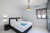 Posteľ alebo postele v izbe v ubytovaní The George Villas with Private Pool, close to Mykonos Town - Chora