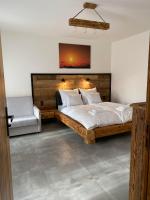 Posteľ alebo postele v izbe v ubytovaní Apartamenty Zander