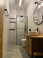 Kúpeľňa v ubytovaní Apartamenty Zander