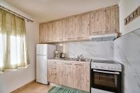 Kuchyň nebo kuchyňský kout v ubytování Ekavi Apartment
