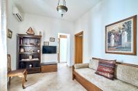 TV a/nebo společenská místnost v ubytování Ekavi Apartment