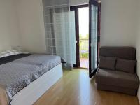 Posteľ alebo postele v izbe v ubytovaní Apartments Krivic