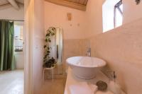 A bathroom at Dimore Santagaeta