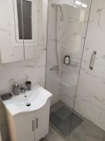 Kúpeľňa v ubytovaní Zeus Apartment