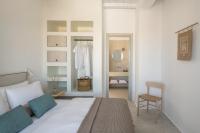 Posteľ alebo postele v izbe v ubytovaní Mykonos Esti Luxury Villas