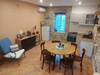 Kuchyň nebo kuchyňský kout v ubytování Holiday home Pepe
