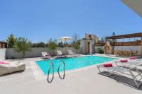The swimming pool at or close to Villa Nikos Olivestone by Villa Plus