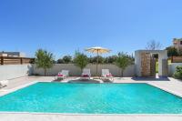 The swimming pool at or close to Villa Nikos Olivestone by Villa Plus