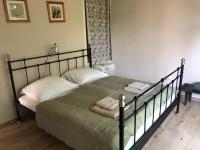 Posteľ alebo postele v izbe v ubytovaní Crystal Spas Apartman-Balaton