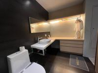 Koupelna v ubytování Veranda Residences Pattaya By Phung