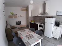 A kitchen or kitchenette at CASA ALEXSA Intero appartamento o CAMERA ALEXSA Camera matrimoniale con patio