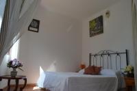 Łóżko lub łóżka w pokoju w obiekcie Goyo Gomera Apartments