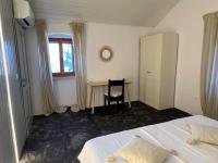Posteľ alebo postele v izbe v ubytovaní Podgora Experience Suite with jacuzzi