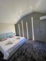 Posteľ alebo postele v izbe v ubytovaní Podgora Experience Suite with jacuzzi