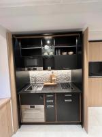 Kuchyň nebo kuchyňský kout v ubytování Podgora Experience Suite II
