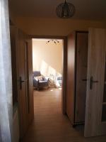 Posteľ alebo postele v izbe v ubytovaní Apartament Karamba