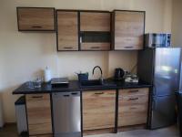Kuchyňa alebo kuchynka v ubytovaní Apartament Karamba