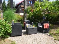 Vonkajšia záhrada v ubytovaní Apartament Karamba
