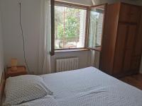 Posteľ alebo postele v izbe v ubytovaní Apartman prvi red do mora Čović