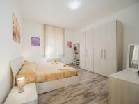 Łóżko lub łóżka w pokoju w obiekcie Holiday Home Elena by Interhome